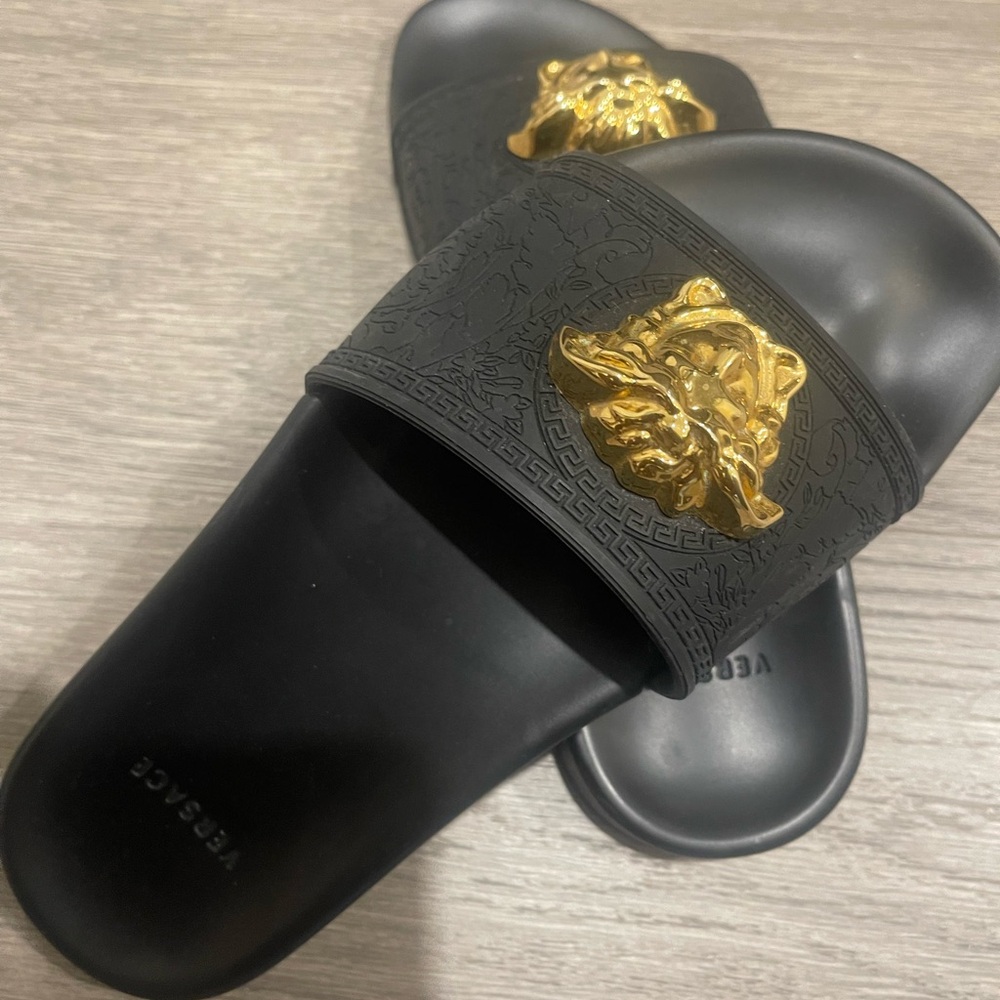 Versace women’s Black Slides with Gold Medusa